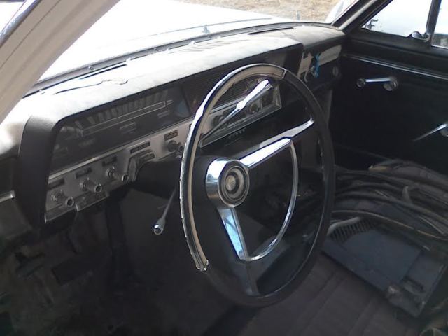 1965 white AMC Other