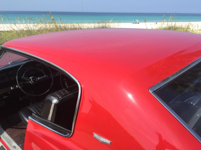 1966 red Chevrolet Capriceold