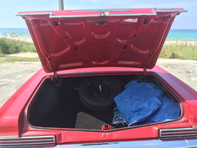 1966 red Chevrolet Capriceold