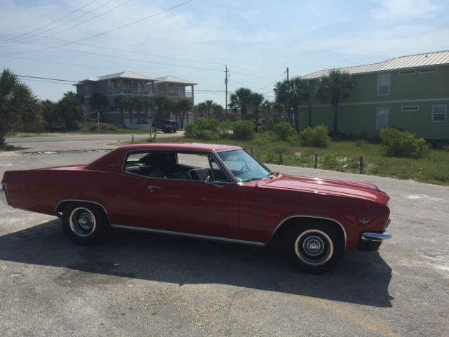 1966 red Chevrolet Capriceold