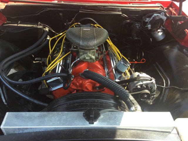 1966 red Chevrolet Capriceold