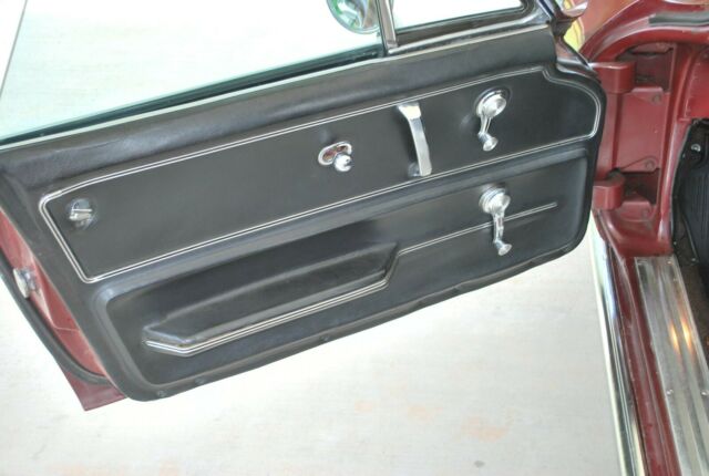 1966 maroon Chevrolet Corvette Convertible