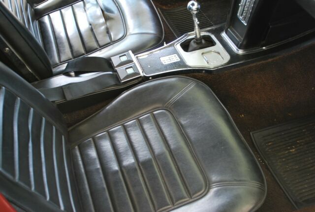 1966 maroon Chevrolet Corvette Convertible