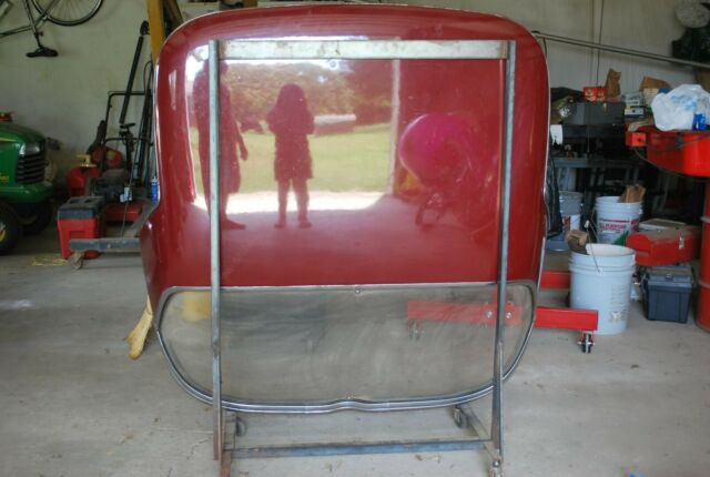 1966 maroon Chevrolet Corvette Convertible