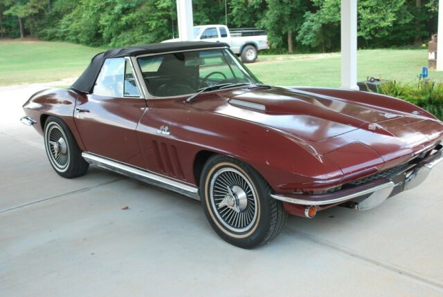 1966 maroon Chevrolet Corvette Convertible