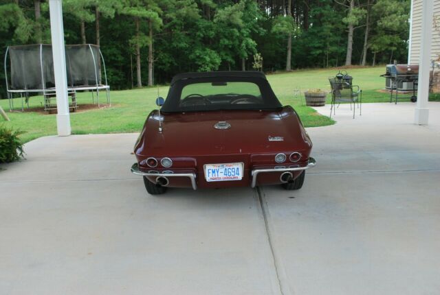 1966 maroon Chevrolet Corvette Convertible