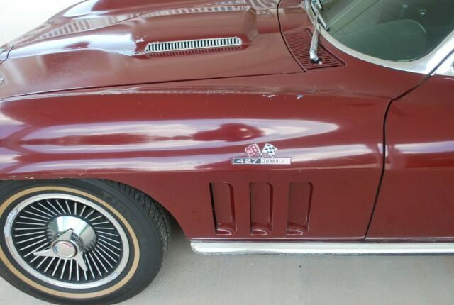1966 maroon Chevrolet Corvette Convertible