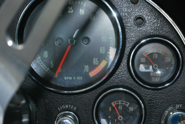1966 maroon Chevrolet Corvette Convertible