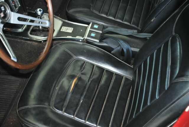 1966 maroon Chevrolet Corvette Convertible