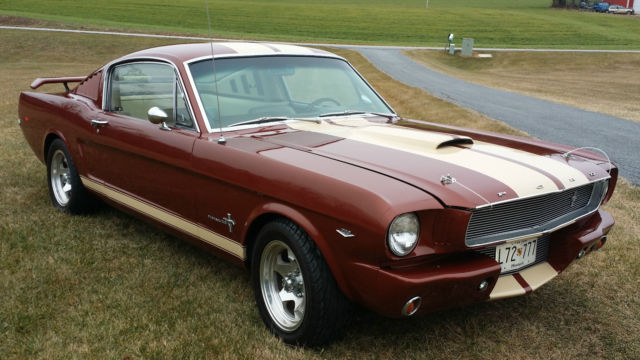 1966 Emberglow with Parchment strip Ford Mustang Fast back