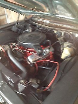 1966 yellow Chevrolet Impala Coupe