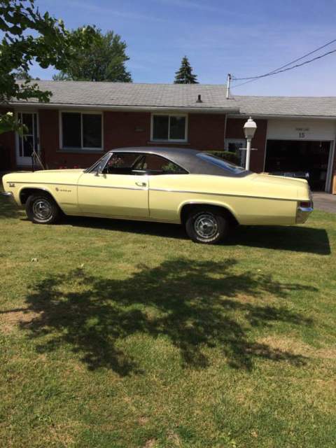 1966 yellow Chevrolet Impala Coupe