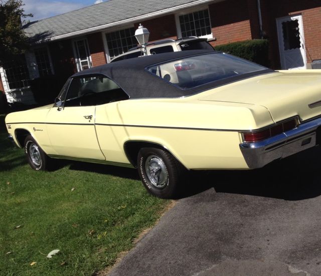 1966 yellow Chevrolet Impala Coupe