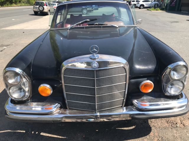 1967 Black Mercedes-Benz 200-Series Coupe