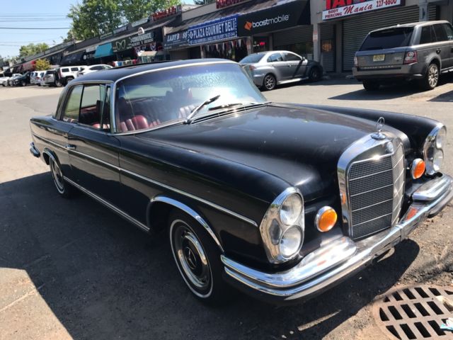 1967 Black Mercedes-Benz 200-Series Coupe