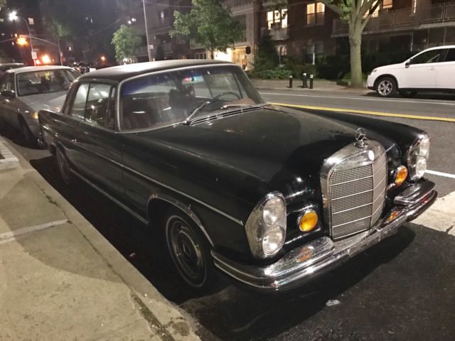 1967 Black Mercedes-Benz 200-Series Coupe
