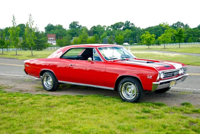1967 red Chevrolet Chevelle Coupe