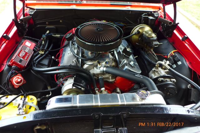 1967 red Chevrolet Chevelle Coupe