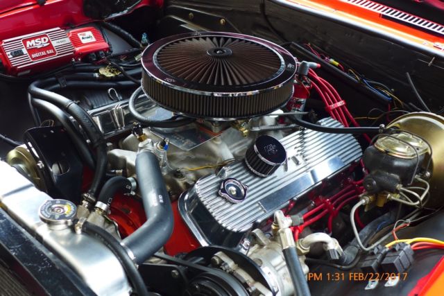 1967 red Chevrolet Chevelle Coupe