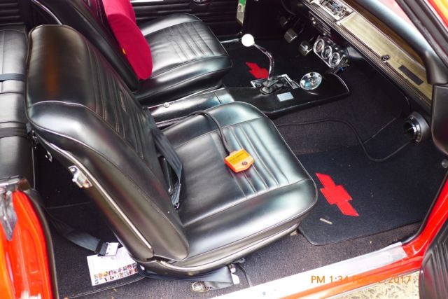 1967 red Chevrolet Chevelle Coupe