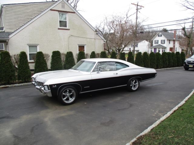1967 Silver/Black with a double red pinstripe Chevrolet Impala Sport Coupe