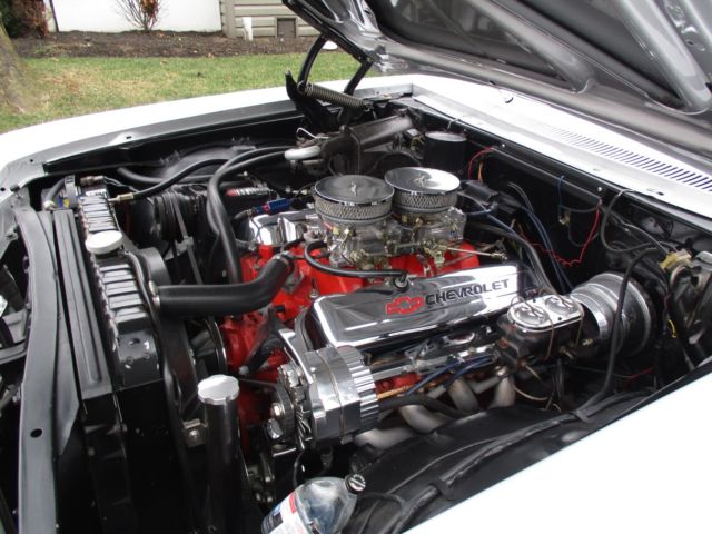 1967 Silver/Black with a double red pinstripe Chevrolet Impala Sport Coupe