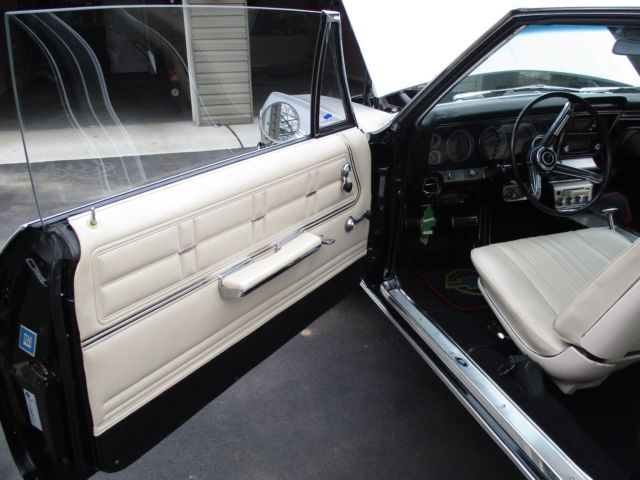 1967 Silver/Black with a double red pinstripe Chevrolet Impala Sport Coupe