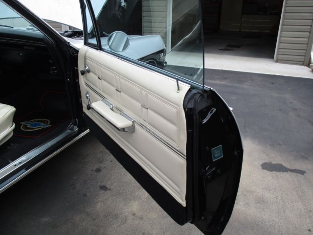 1967 Silver/Black with a double red pinstripe Chevrolet Impala Sport Coupe