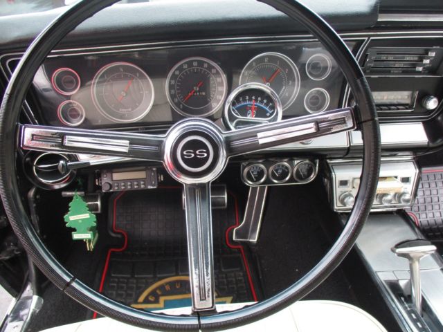1967 Silver/Black with a double red pinstripe Chevrolet Impala Sport Coupe