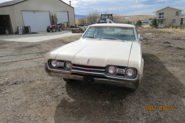 1967 Tan Oldsmobile Cutlass 2 Door