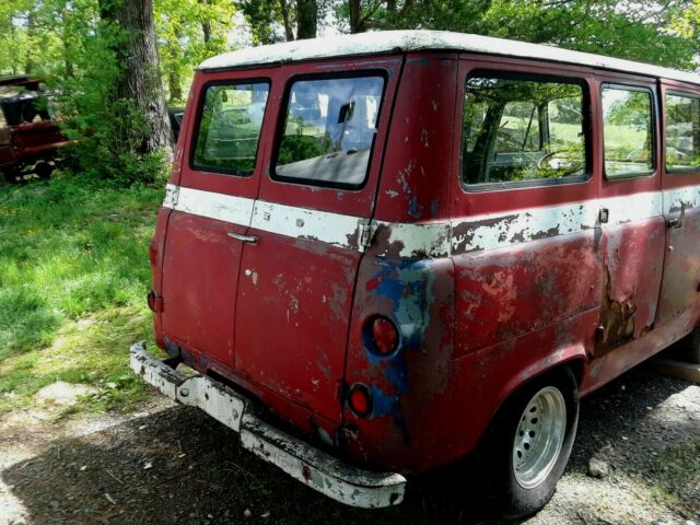 1964 Red and White Ford Falcon Multi window van