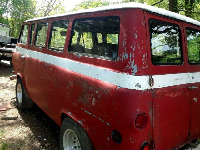 1964 Red and White Ford Falcon Multi window van