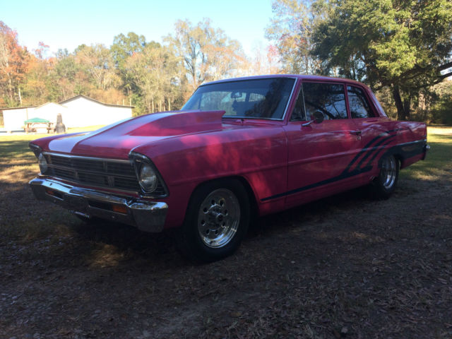 1967 pink Chevrolet Nova Coupe