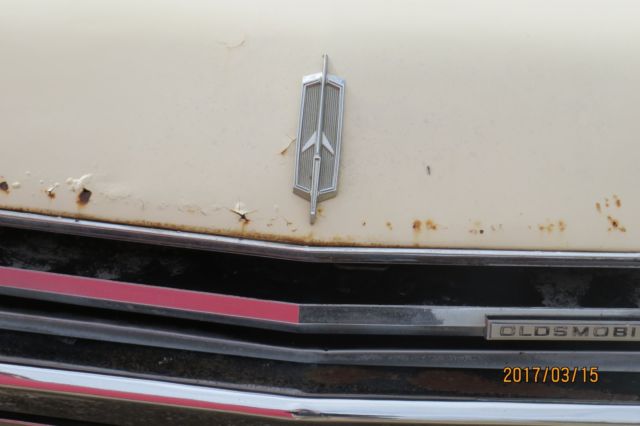 1967 Tan Oldsmobile Cutlass Coupe