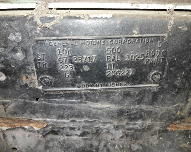 1967 bronze Pontiac Le Mans Coupe