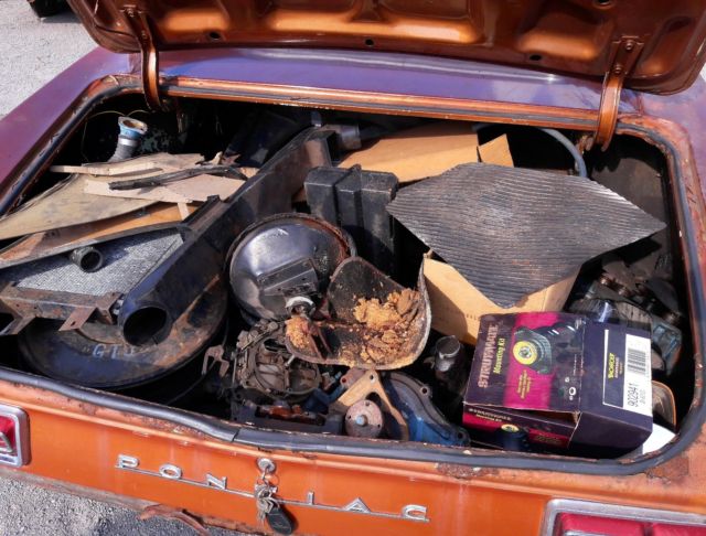 1967 bronze Pontiac Le Mans Coupe