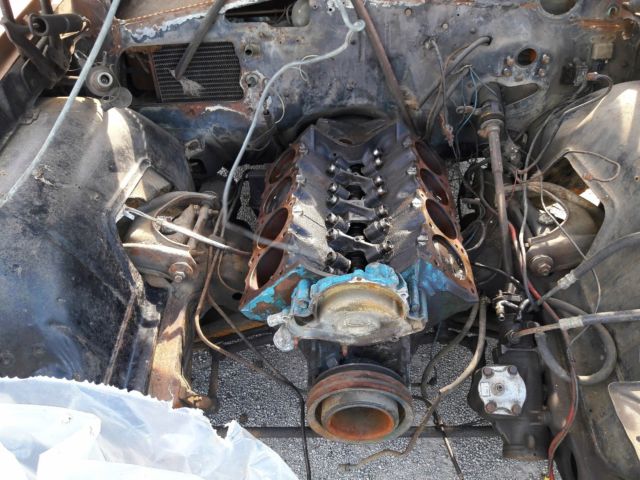 1967 bronze Pontiac Le Mans Coupe