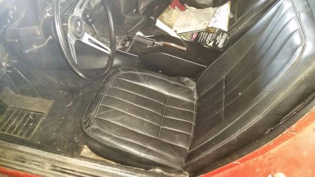 1968 red Chevrolet Corvette Coupe