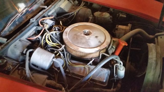 1968 red Chevrolet Corvette Coupe