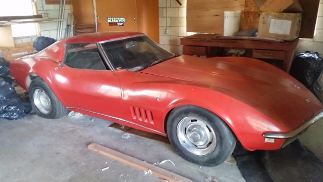 1968 red Chevrolet Corvette Coupe