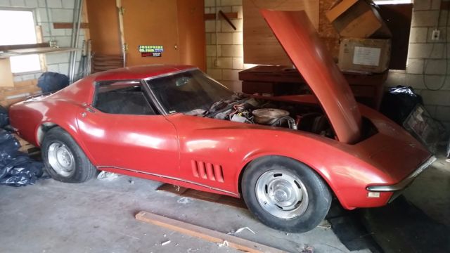 1968 red Chevrolet Corvette Coupe
