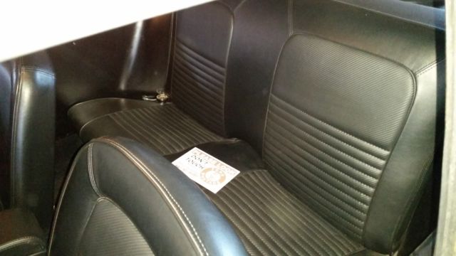 1968 Burgundy Ford Mustang