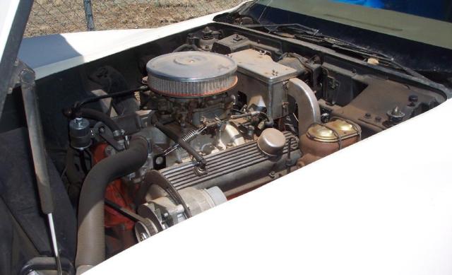 1969 cream Chevrolet Corvette Coupe