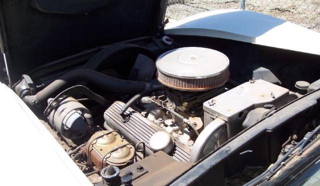 1969 cream Chevrolet Corvette Coupe