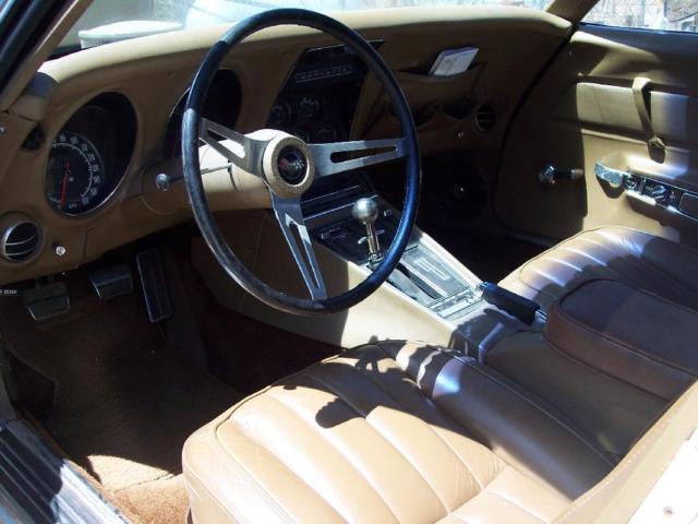 1969 cream Chevrolet Corvette Coupe