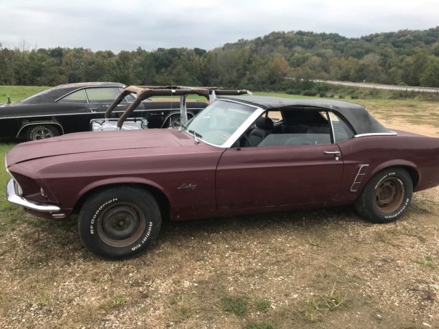 1969 royal maroon Ford Mustang