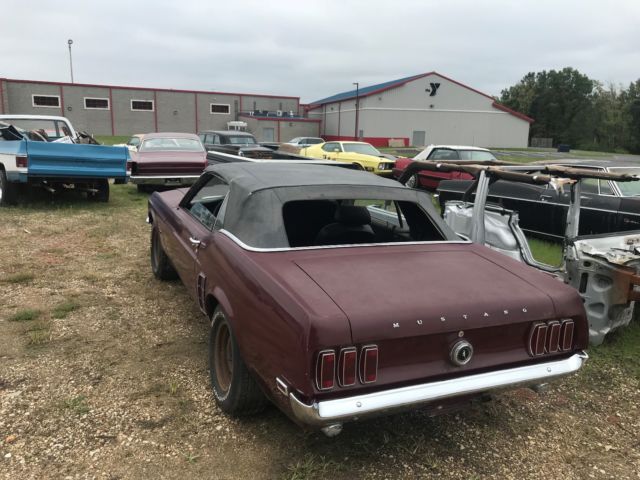 1969 royal maroon Ford Mustang