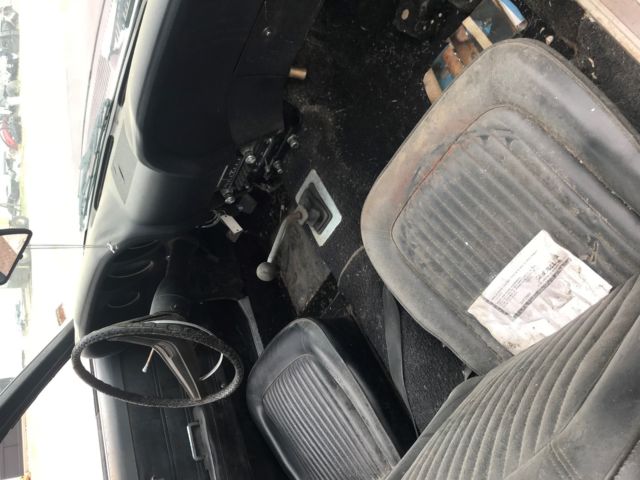 1969 royal maroon Ford Mustang