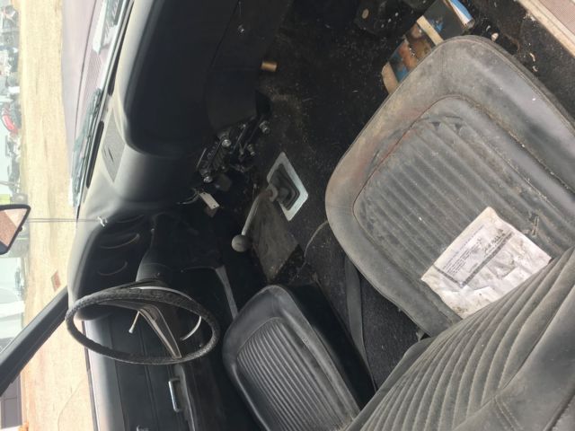 1969 royal maroon Ford Mustang