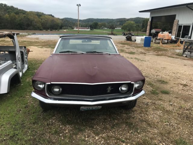 1969 royal maroon Ford Mustang